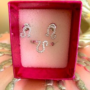 Sterling Silver earrings and matching ring. Stamped 925